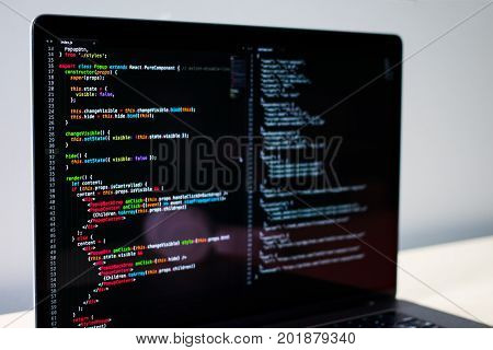 Frontend developer's laptop screen with some JS code
