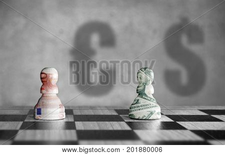 Chess pieces with euro verus dollar currency symbol shadows in the background
