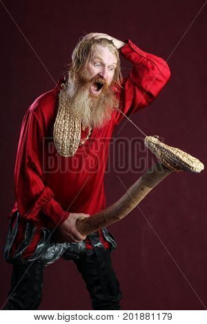 A Man In A Red Shirt