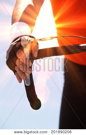 Man With His Hand on His Bcycle's Brake