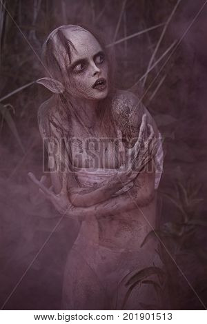 Portrait Of A Horrible Scary Fantasy Style Mystic Creature. Horror Or Halloween Concept.