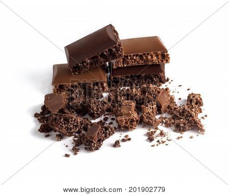 A slice of porous chocolate slices on a white background