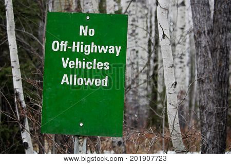A No Off Highway Vehicles Allowed sign.