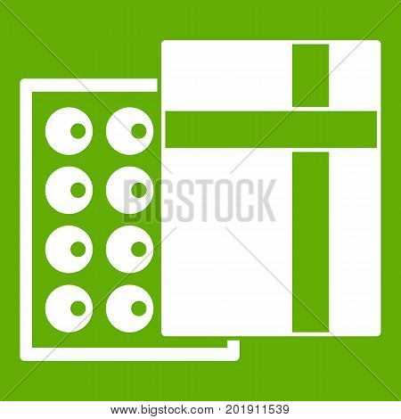 Box with chocolates icon white isolated on green background. Vector illustration