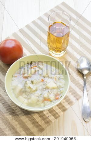 Vegetarian soup made from cauliflower and vegetables.