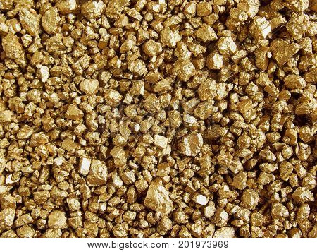 Gold nugget grains abstract for background design.