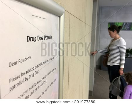 AUCKLAND - AUG 18 2017: Drug Dog Patrol sign in a residential building.The New Zealand Drug Harm Index 2016 estimated the social cost of drug-related harms and intervention in 2014/15 at $1.8 billion.