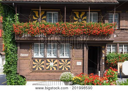 The Typical Chalet At Burglen On The Swiss Alps