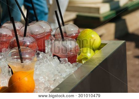 Glasses With Multi-colored Smuz And Tubules On A Counter Of Street Trade