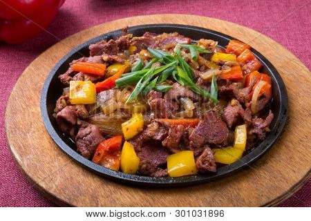 Meat Mix Sizzler Prepared And Served For Lunch