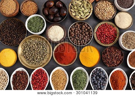Aromatic Spices And Herbs In Metal And Ceramic Bowls. Top View.