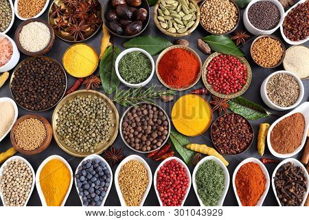 Aromatic Spices And Herbs In Metal And Ceramic Bowls. Top View.