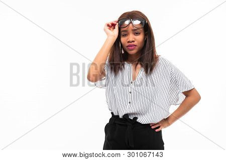 Portrait Of African Expresive Young Girl Possing On Background