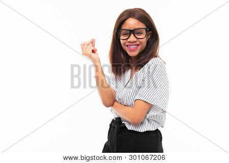 Portrait Of African Expresive Young Girl Possing On Background