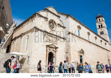 Dubrovnik, Croatia - April, 2018: Tourists At The Church Of St. Spasa Located At Stradun Street In T