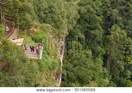 Canela , Brazil - May 12, 2019. 
Tourists Observing A Snail Cascade (cascade Of Caracol) In Park Loo