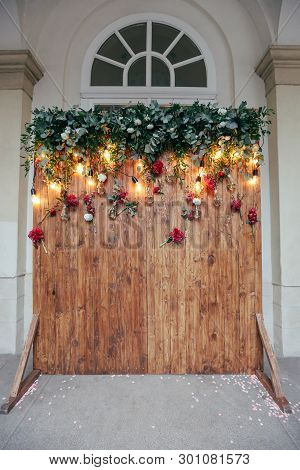 Rustic Wedding Photo Zone. Hand Made Wedding Decorations Includes Photo Booth  Red Flowers. Garlands