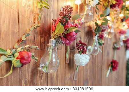 Rustic Wedding Photo Zone. Hand Made Wedding Decorations Includes Photo Booth  Red Flowers. Garlands