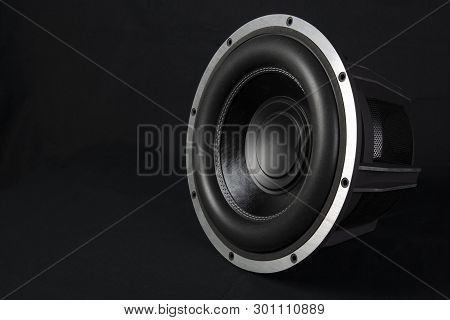Car Audio System. Car Music. Subwoofer On Black Background.