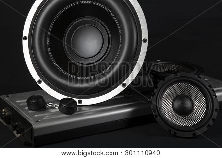 Car Audio System. Car Music. Subwoofer On Black Background.