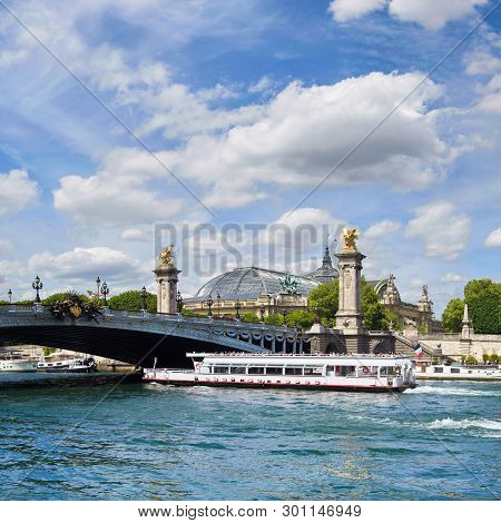 Paris, France, Passenger Ship Passes Under Alexander Iii Bridge On Seine River On A Bright Day In Sp