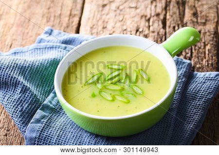 Cream Of Green Asparagus Soup In Bowl, Garnished With Sliced Asparagus On Top (selective Focus, Focu