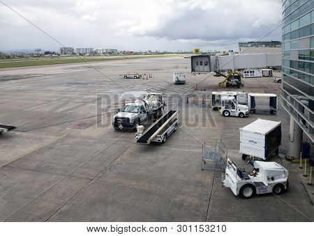 Carolina, Puerto Rico - February 28, 2019:  Jet Blue Ground Support Equipment And Vehicles At San Ju