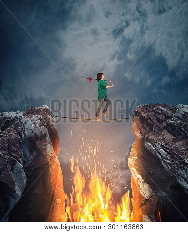 Surreal Challenge Overcome . Woman Conquering Obstacle Balancing On Slackline Rope Above A Gap With 