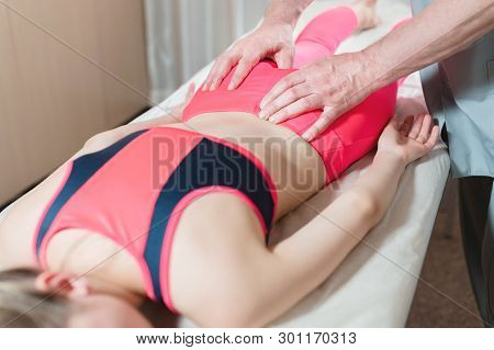 Girls Spine Base Editing By A Male Physiotherapist Of Visceral Massage. The Hands Of The Doctor Set 