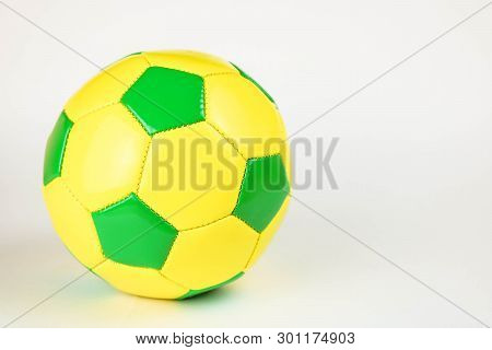 Yeallow And Gree Football Ball. Classic Soccer Ball.