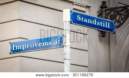 Street Sign The Direction Way To Improvement Versus Standstill