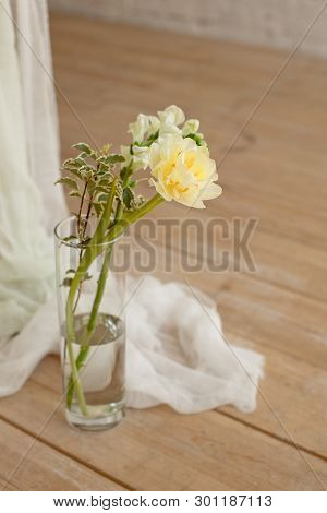 Branch Of Blooming White Peony Tulip Mattiola Branch In A Glass Vase White Wax Candles Stand On The 