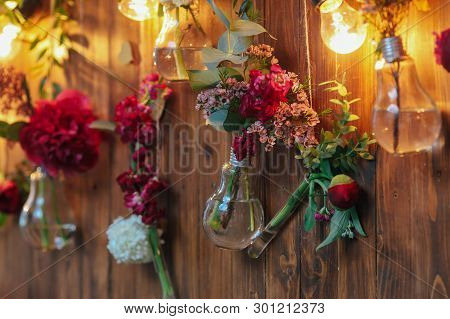 Rustic Wedding Photo Zone. Hand Made Wedding Decorations Includes Photo Booth  Red Flowers. Garlands