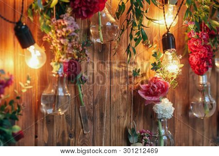 Rustic Wedding Photo Zone. Hand Made Wedding Decorations Includes Photo Booth  Red Flowers. Garlands
