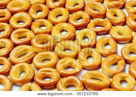 Drying Or Bagels On A White Background, Bright Colors, High Contrast.