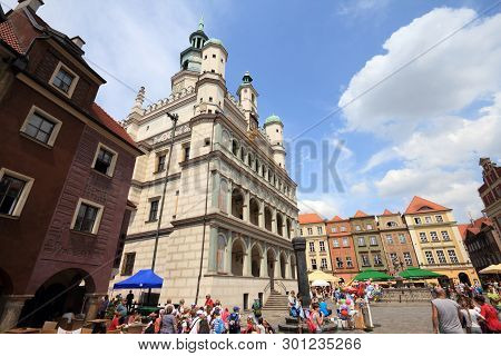 Poznan, Poland - June 7, 2011: People Visit The Main Square (rynek) In Poznan City. With 1.7m Visito