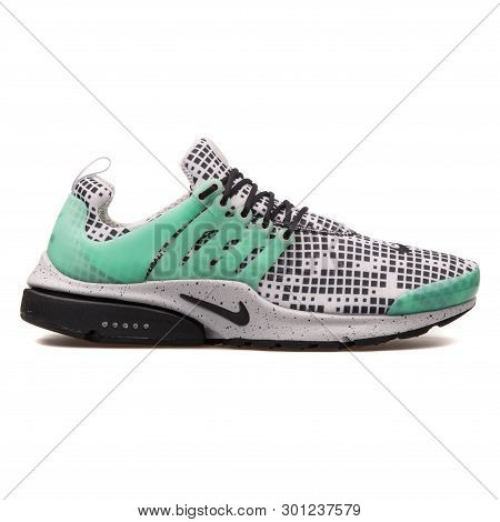 Vienna, Austria - August 10, 2017: Nike Air Presto Gpx White, Black And Green Sneaker On White Backg