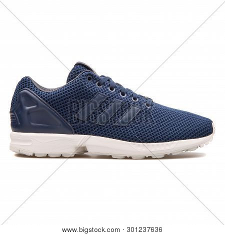 Vienna, Austria - August 10, 2017: Adidas Zx Flux Navy Blue Sneaker On White Background.