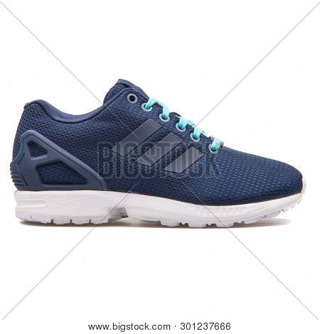 Vienna, Austria - August 10, 2017: Adidas Zx Flux Indigo Blue Sneaker On White Background.