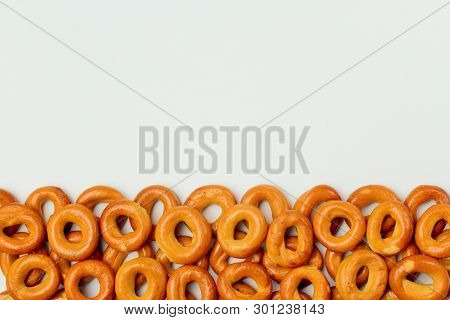 Appetizing Crispy Drying Or Bagels On A White Background, There Is A Place For Text. Bright Colors, 