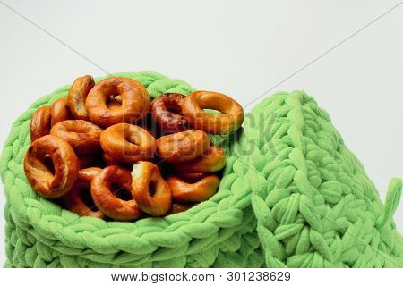 Drying In A Green Basket, Made By Hand, On A White Background, A Lot Of Space For Text. Bright Color