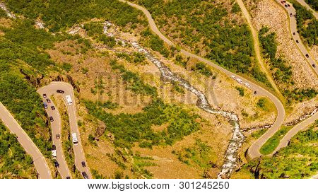 Trolls Path Trollstigen Winding Scenic Mountain Road With Many Cars, Norway Europe. National Tourist