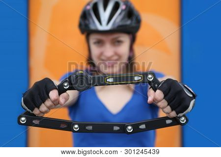 Girl In A Helmet  With Bicycle Lock