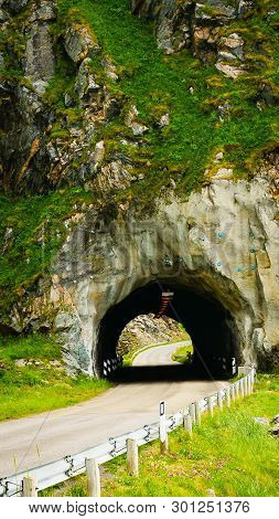 Road With Old Tunnel In Green Summer Mountains, Norway. National Tourist Andoya Route.