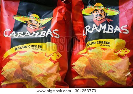 Volzhsky, Russia - Apr 26, 2019: Products Of Hypermarket Sale Of Carambas Corn Chips Beverages In Th