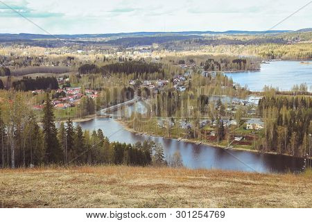 Beautiful Views Of The Mountains To The Lakes, Houses, Birches And Forest. Finnish Landscape. Lakes 