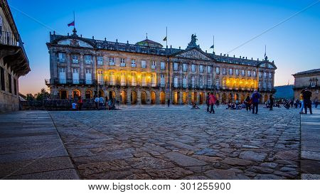 Santiago De Compostela , Spain - May 12, 2019: Tourists And Pilgrims Roam The Streets Where Magnific