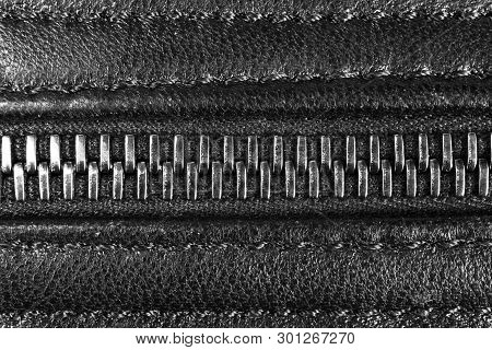 Macro Shot Of Zipper On Black Leather Texture Background With Stitching. Horizontal Background From