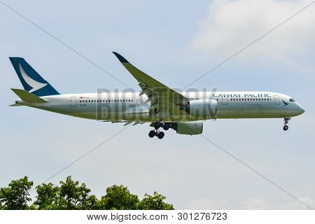 Passenger Airplane Landing At Bangkok Airport