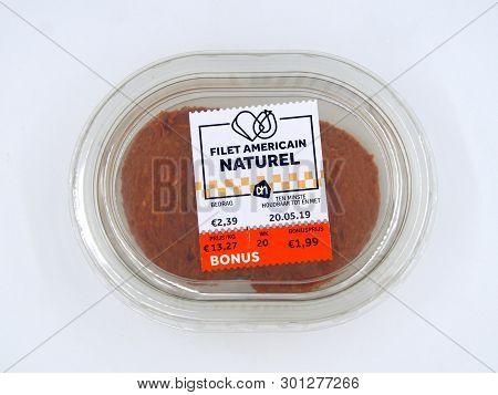 Amsterdam, The Netherlands - May 15, 2019: Package Of Filet Americain Naturel Against A White Backgr